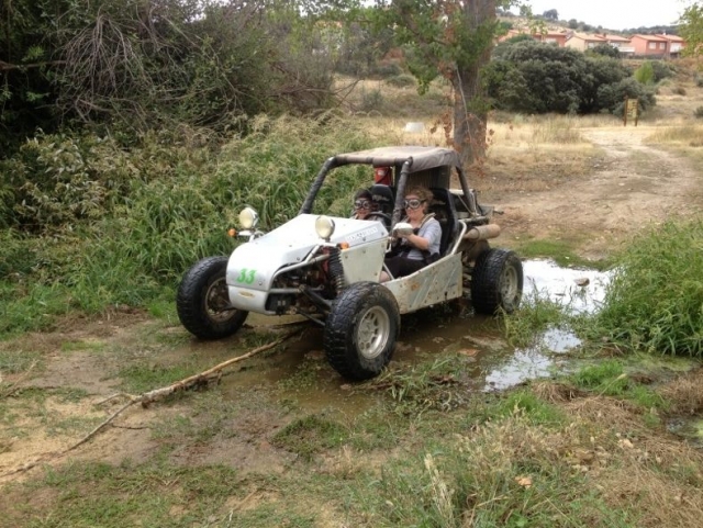  Girls crossing a puddle 